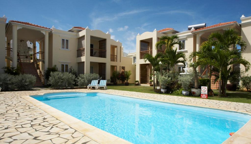 Bazén v ubytování La Pointe Villas nebo v jeho okolí