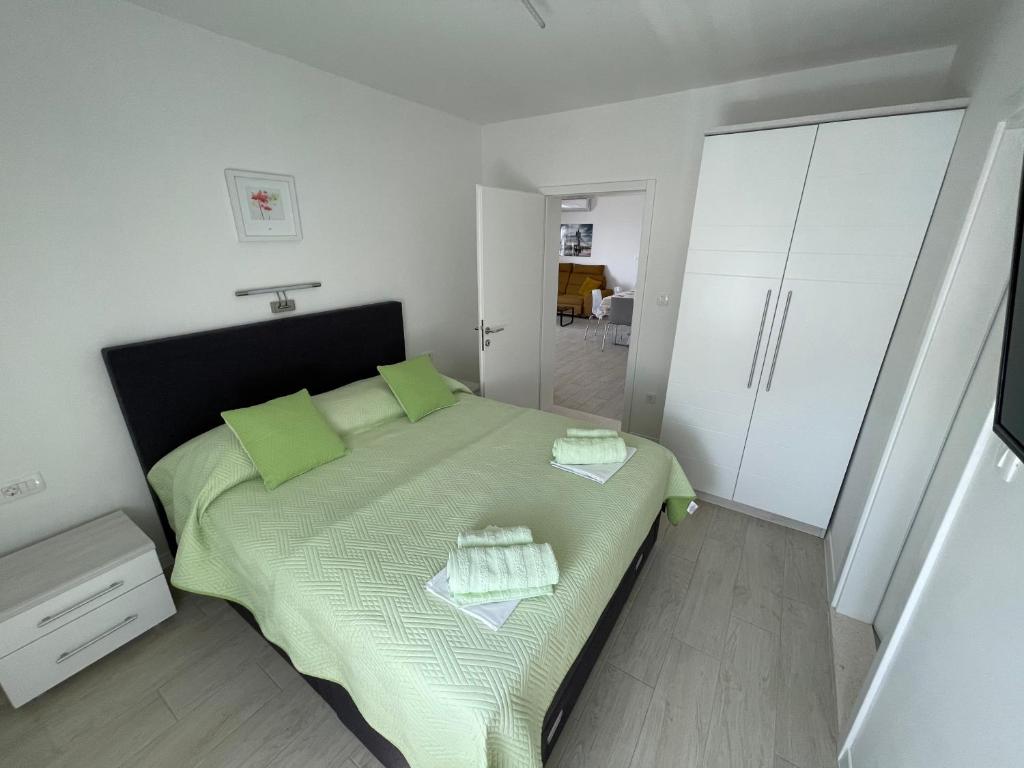 Posteľ alebo postele v izbe v ubytovaní Apartman Mili