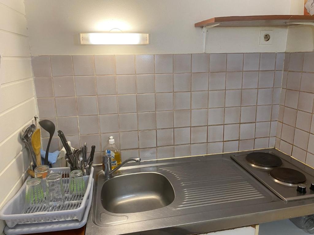 Kuchyň nebo kuchyňský kout v ubytování Appartement Vanille 2