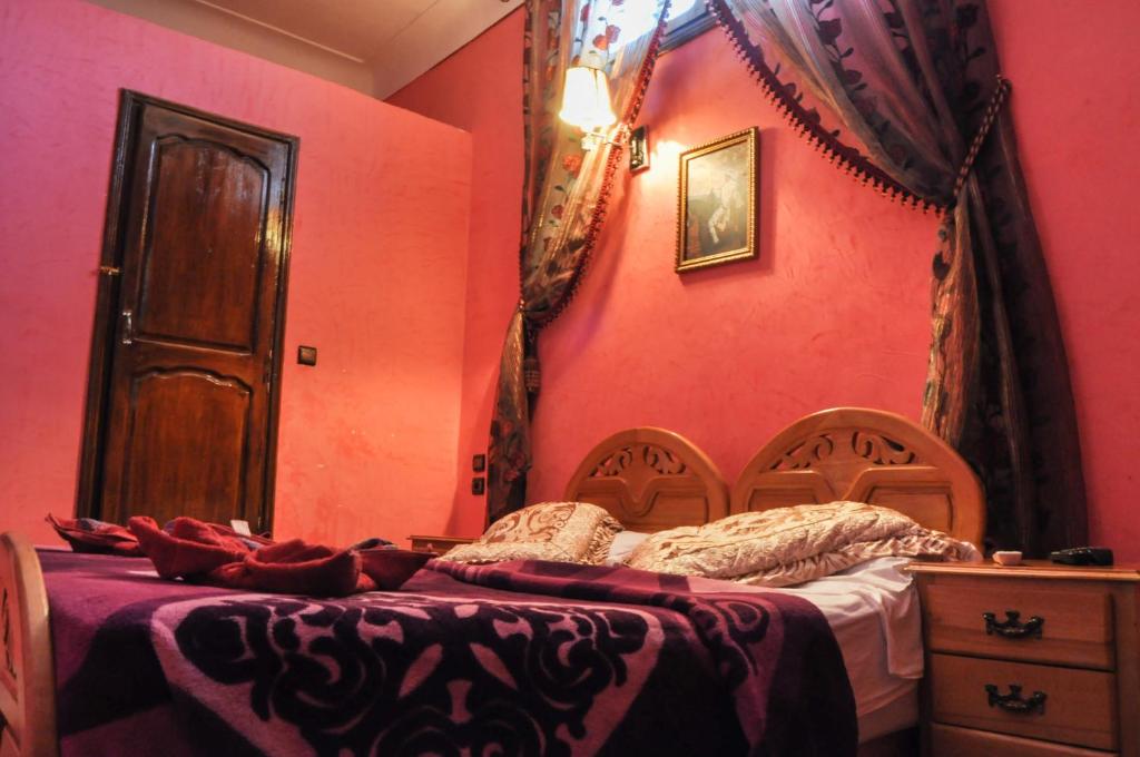 Postel nebo postele na pokoji v ubytování Riad Fattouma Kasba
