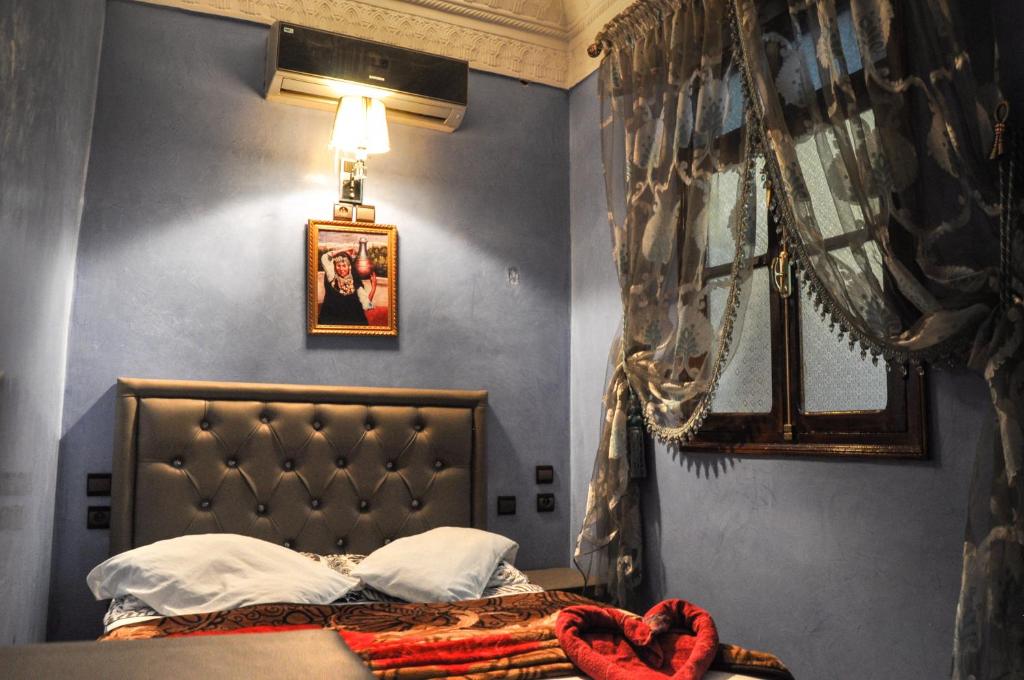 Postel nebo postele na pokoji v ubytování Riad Fattouma Kasba
