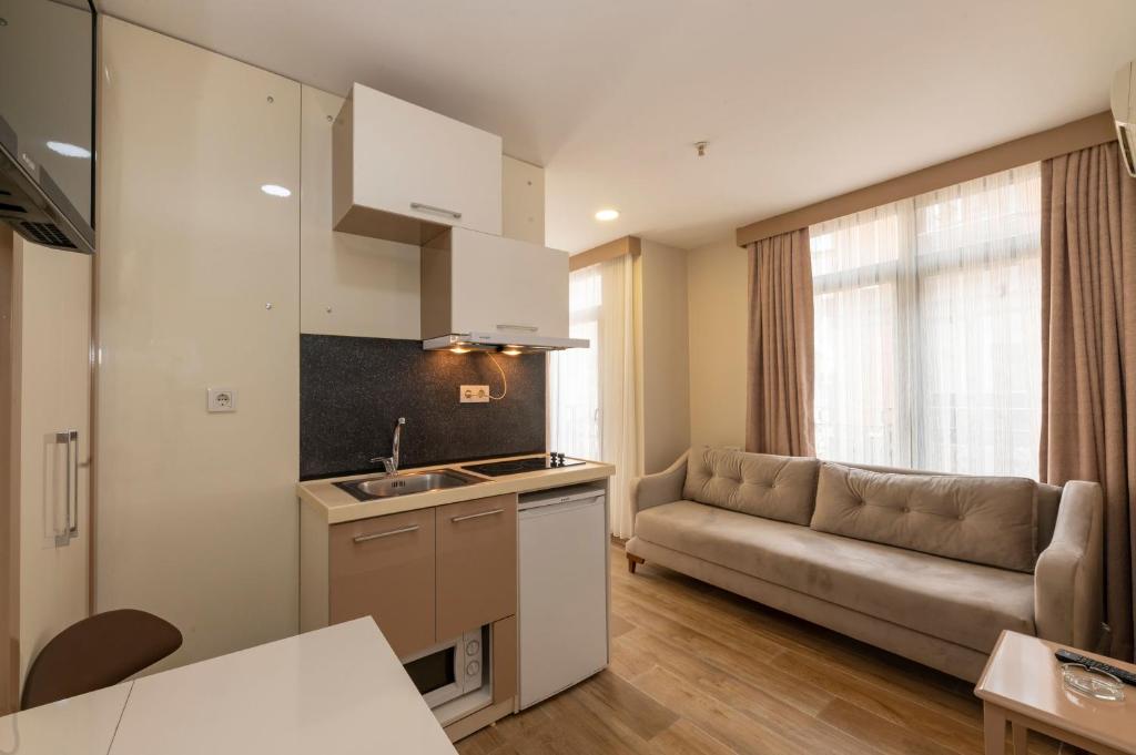 Kuchyň nebo kuchyňský kout v ubytování Taksim Peri Suite