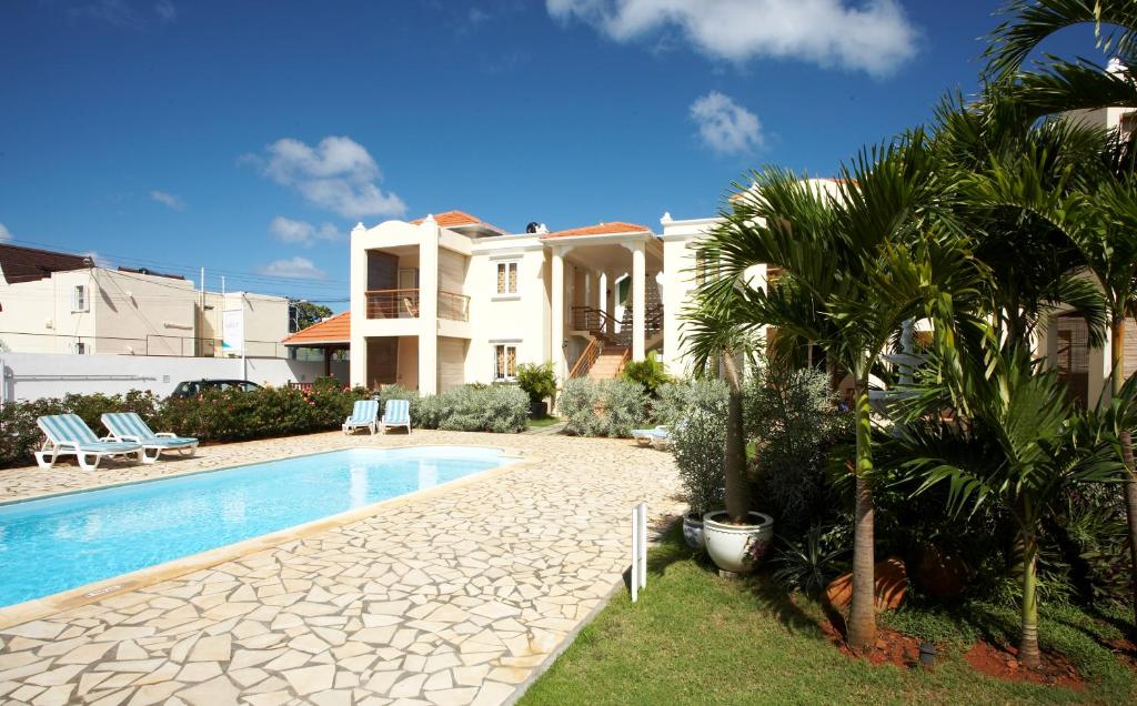 Bazén v ubytování La Pointe Villas nebo v jeho okolí