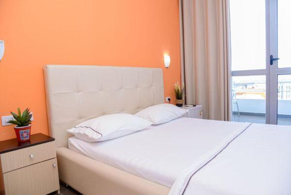 Postel nebo postele na pokoji v ubytování Hotel Aurora