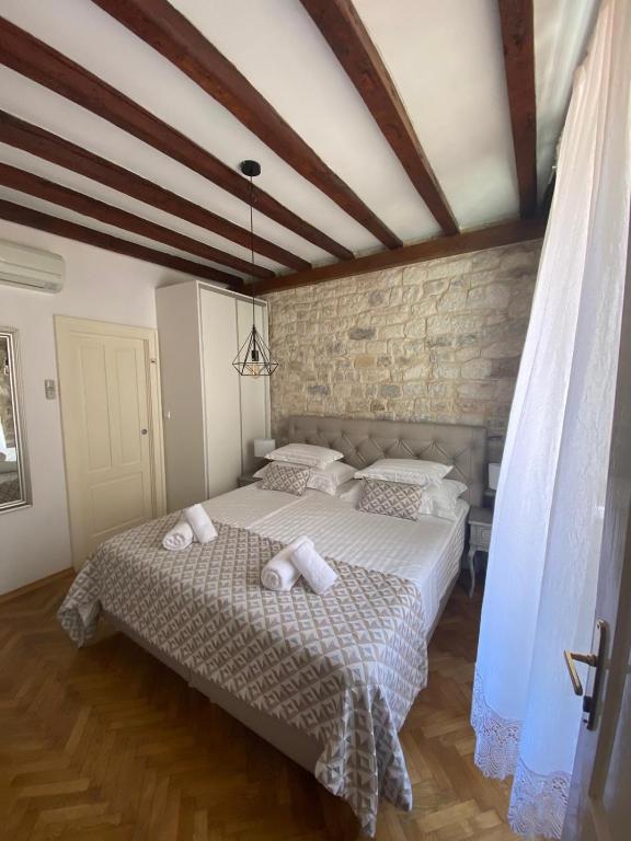 Postel nebo postele na pokoji v ubytování Palace Wall Residences