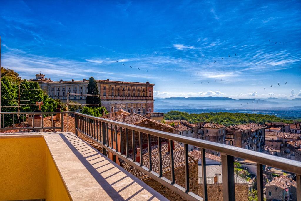 a view of a city from a balcony at Casa Checca appartamenti per vacanze in Caprarola
