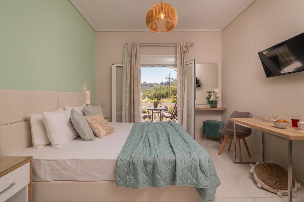 Posteľ alebo postele v izbe v ubytovaní Margaritari Apartments