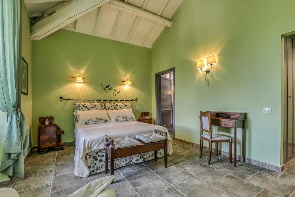 Postel nebo postele na pokoji v ubytování Relais Pian Di Vico