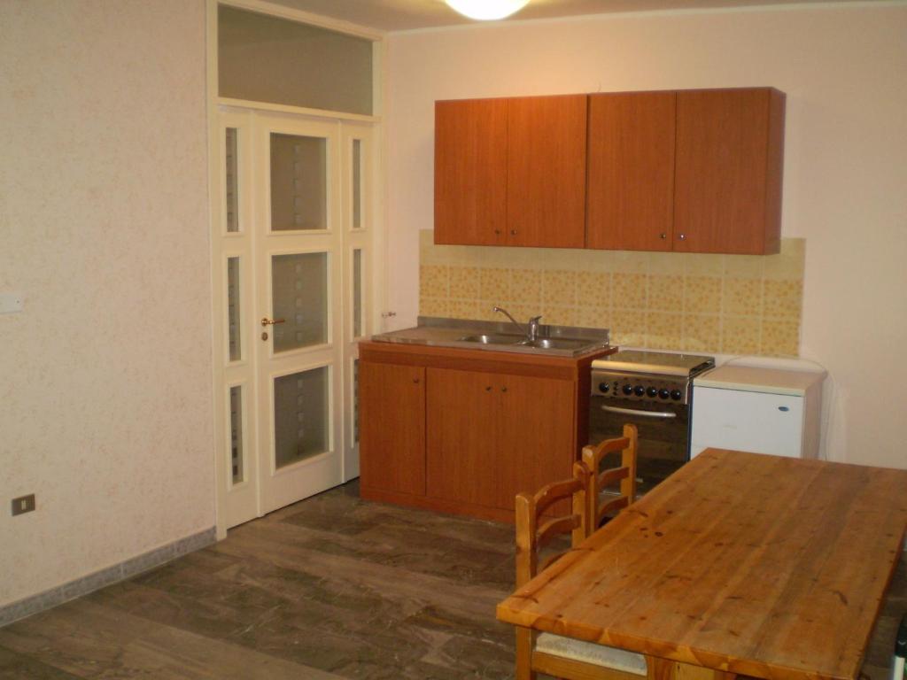 Kuchyň nebo kuchyňský kout v ubytování Hotel Tania