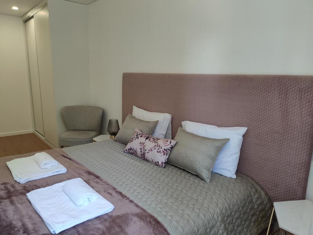 Llit o llits en una habitació de Suite na baixa do Porto