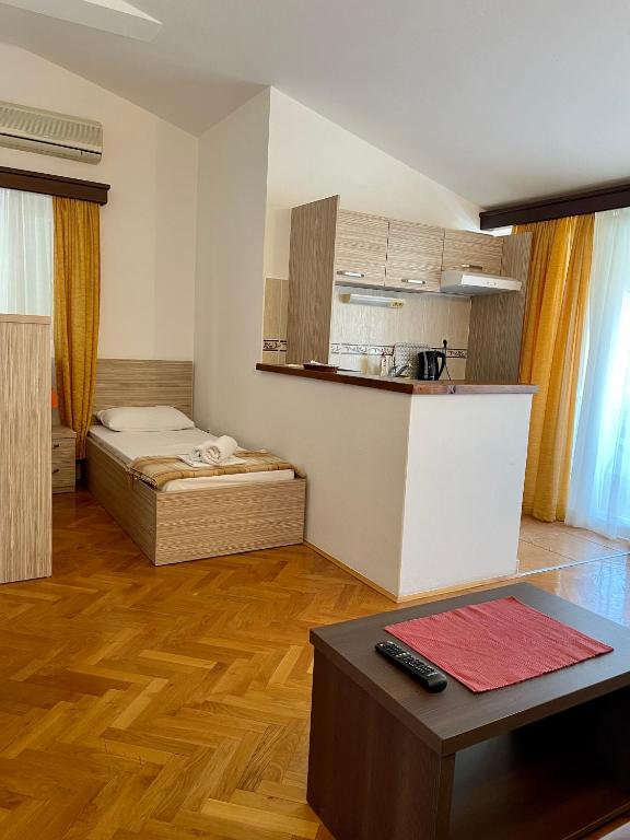 Postel nebo postele na pokoji v ubytování Guest House Maslina