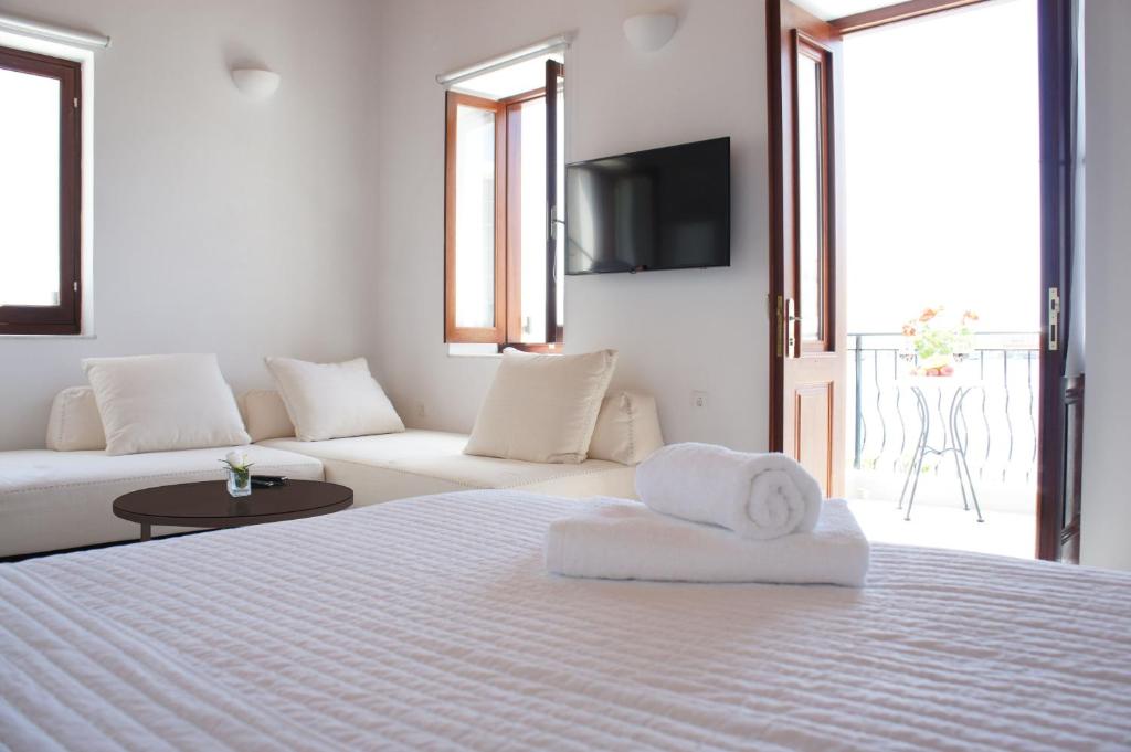 Postel nebo postele na pokoji v ubytování Aegean View Villas