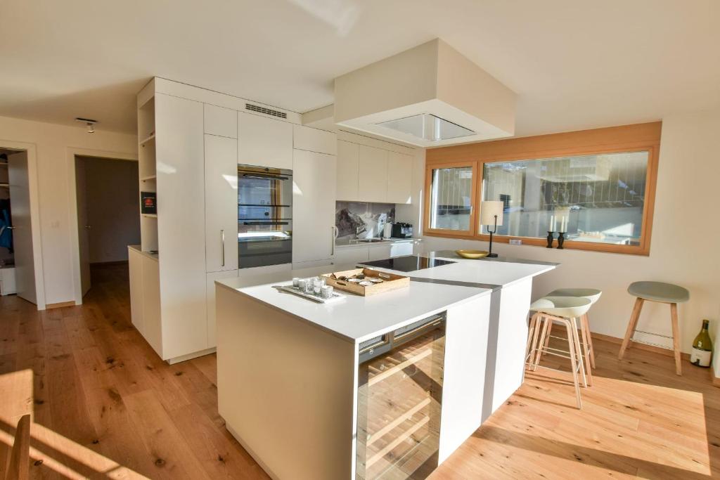 Kuchyň nebo kuchyňský kout v ubytování Milachra Penthouse
