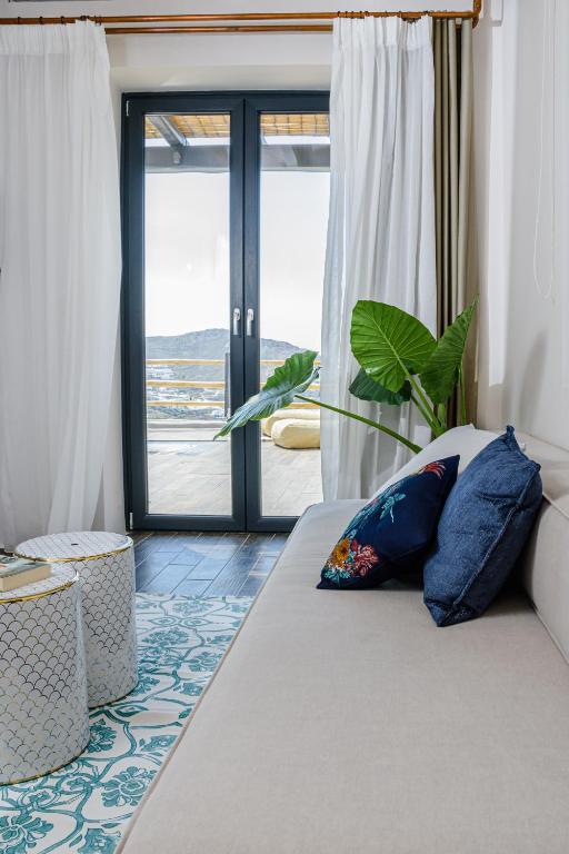 Postel nebo postele na pokoji v ubytování Maregold Mykonos Micro-Boutique Suites, Adults Only