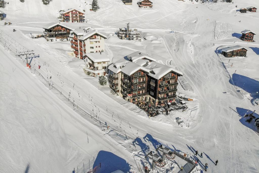 an aerial view of a resort in the snow at Weisshorn 24 in Riederalp