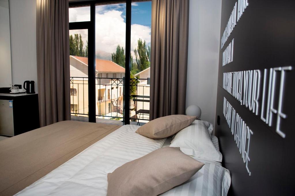 Postel nebo postele na pokoji v ubytování Maison