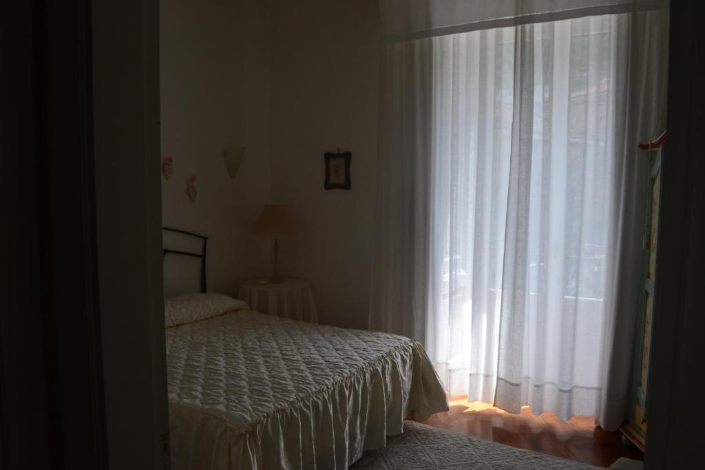 Posteľ alebo postele v izbe v ubytovaní Casa Mariannina