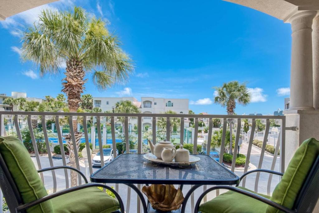 a table on a balcony with a view of the resort at 417 Montego Bay Court, St. Augustine, FL 32080 in Butler Beach