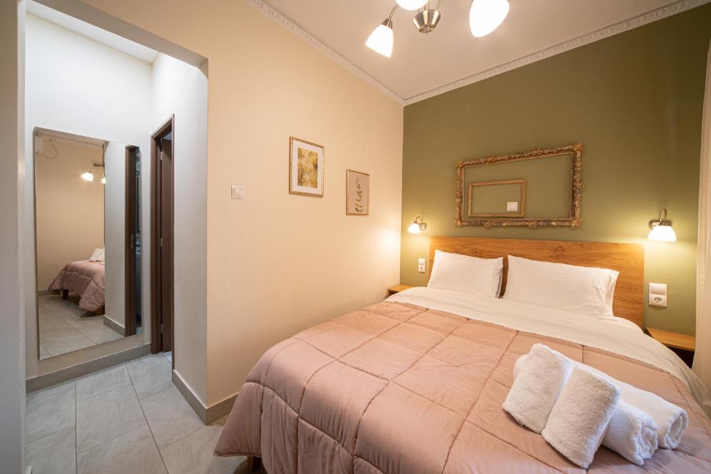 Postel nebo postele na pokoji v ubytování Beautiful City Suites