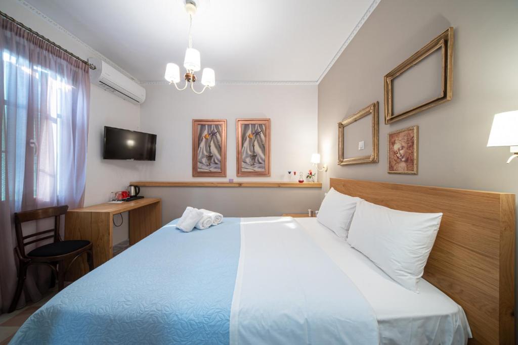 Postel nebo postele na pokoji v ubytování Beautiful City Suites