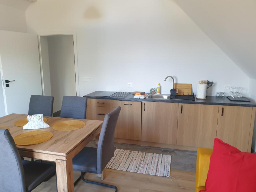 Kuchyň nebo kuchyňský kout v ubytování Apartamenty na Rycerskiej