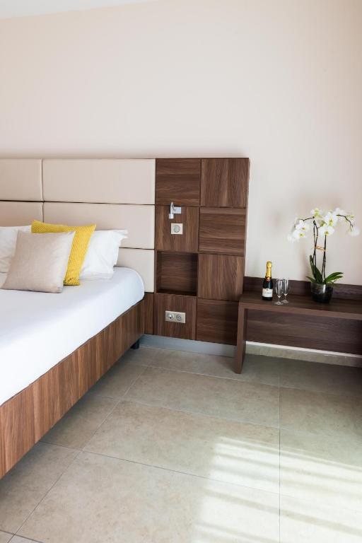 Postel nebo postele na pokoji v ubytování Hotel Port Toga