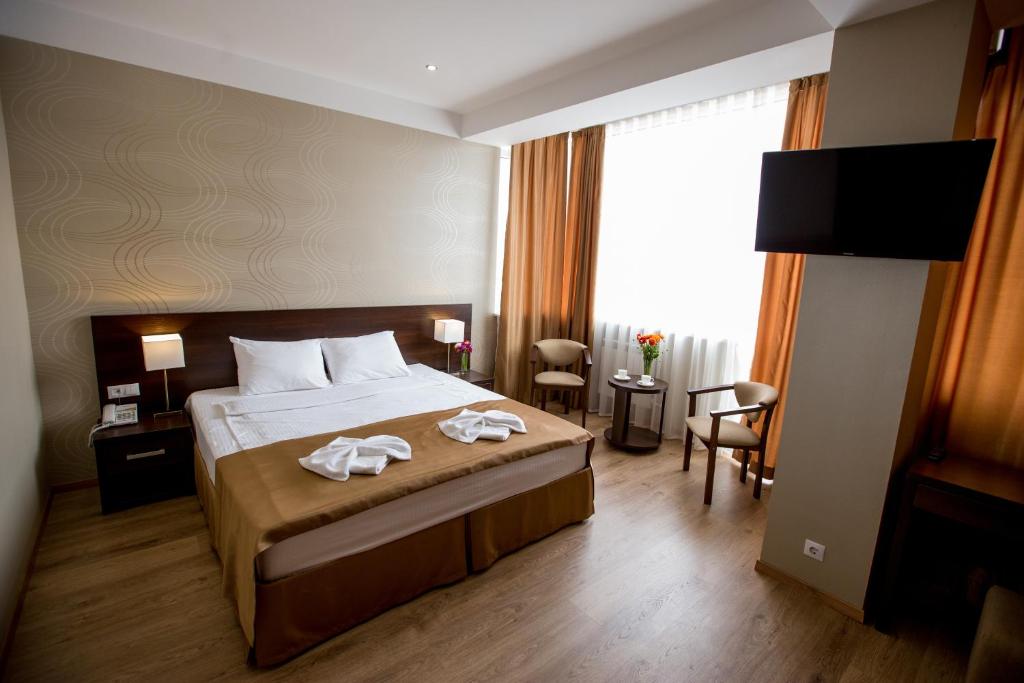 Cama o camas de una habitación en Hotel Allegro