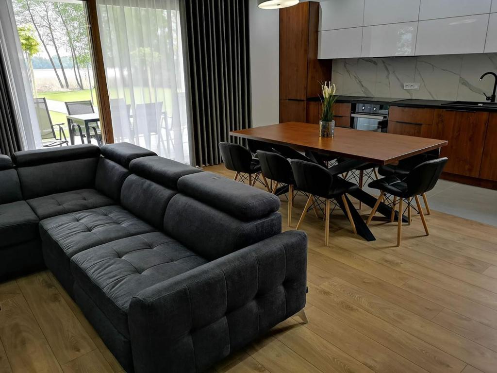 Kuchyňa alebo kuchynka v ubytovaní APARTAMENTY SKORUPKI-Mazury Mikołajki