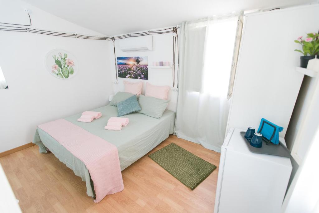Postel nebo postele na pokoji v ubytování Casa Giulia