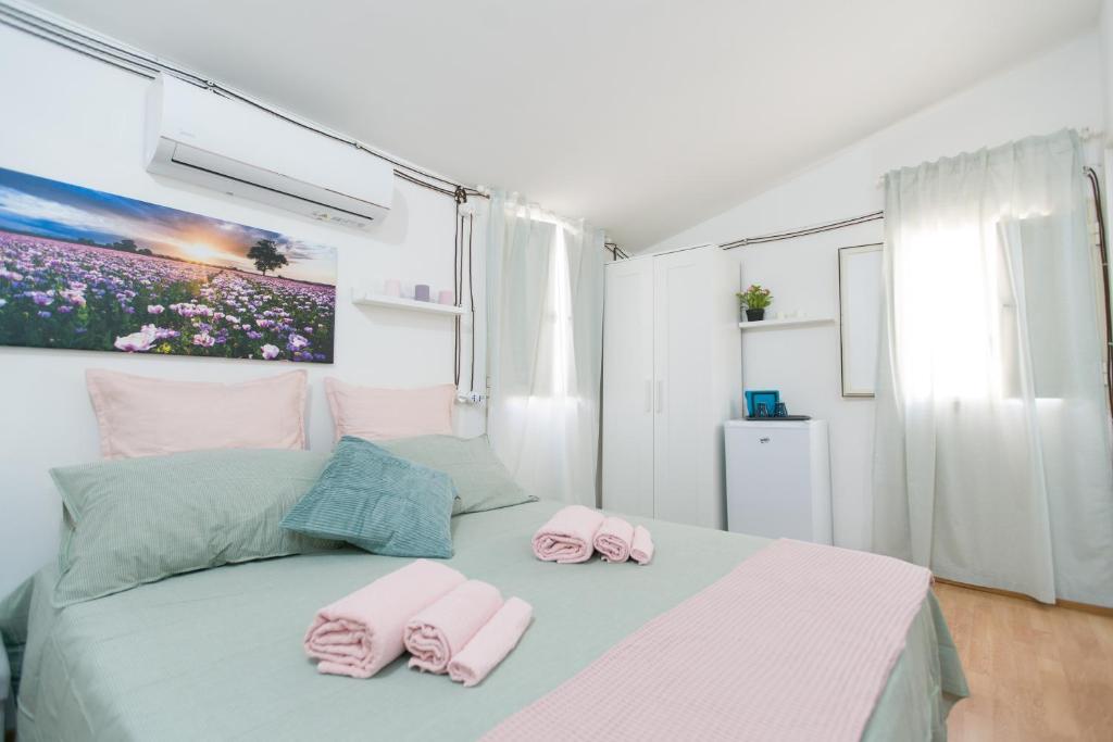 Postel nebo postele na pokoji v ubytování Casa Giulia