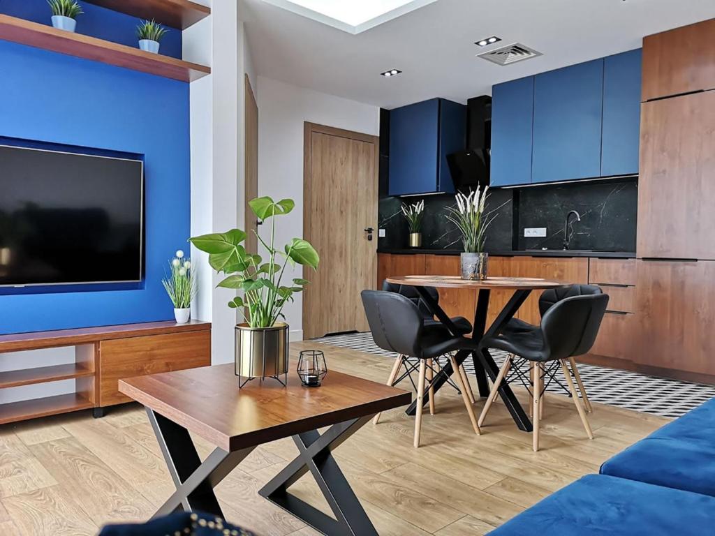 Kuchyňa alebo kuchynka v ubytovaní APARTAMENTY SKORUPKI-Mazury Mikołajki
