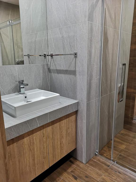 Kúpeľňa v ubytovaní APARTAMENTY SKORUPKI-Mazury Mikołajki