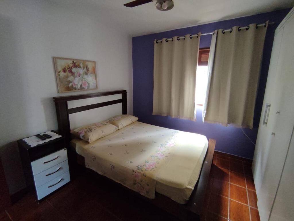 מיטה או מיטות בחדר ב-Recanto Verde