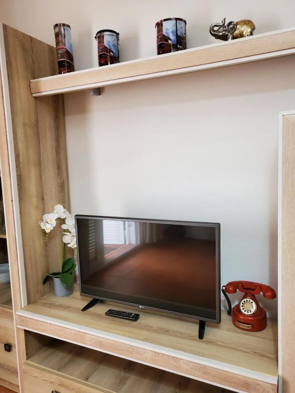 Televízia a/alebo spoločenská miestnosť v ubytovaní DUPLEX ESPECTACULAR en PRIMERA LÍNEA NATURISTA!
