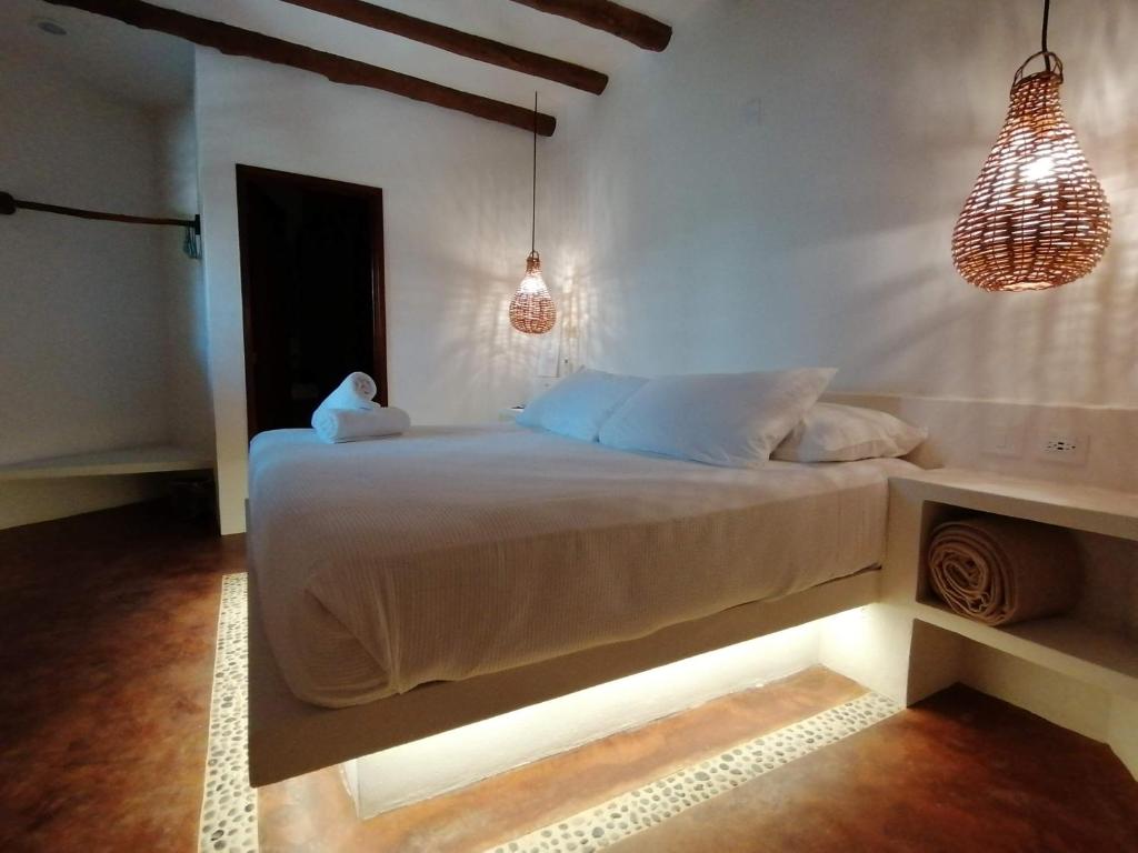 Letto o letti in una camera di Casa Mech