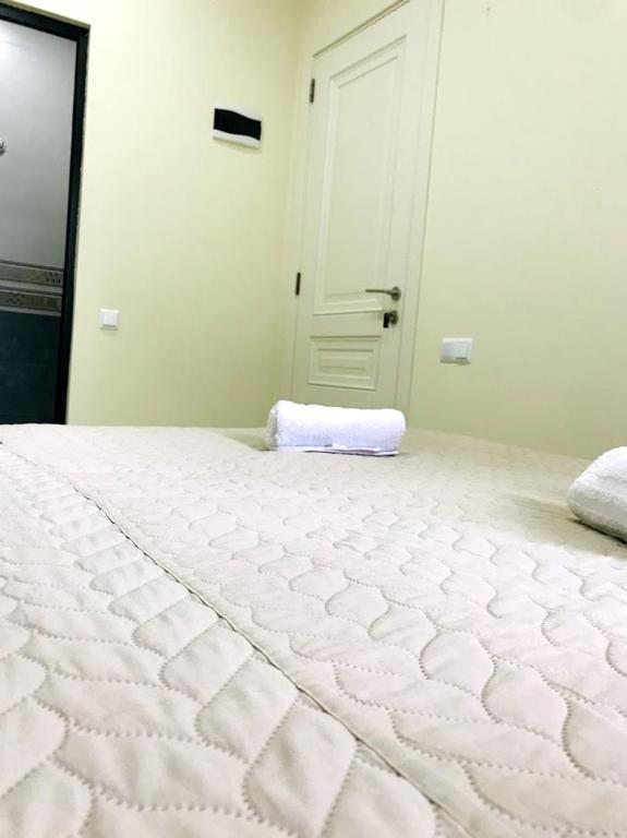 Postel nebo postele na pokoji v ubytování Gurya