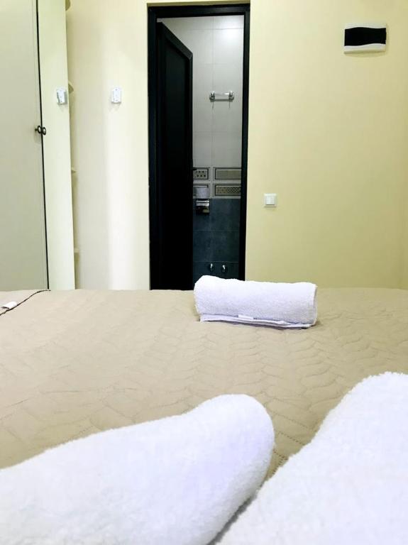 Postel nebo postele na pokoji v ubytování Gurya
