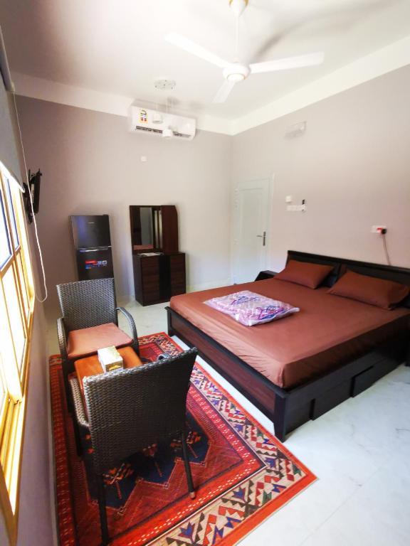 Postel nebo postele na pokoji v ubytování Al Hamra Guest House