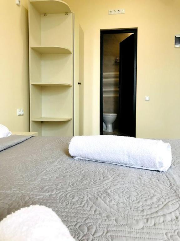 Postel nebo postele na pokoji v ubytování Gurya