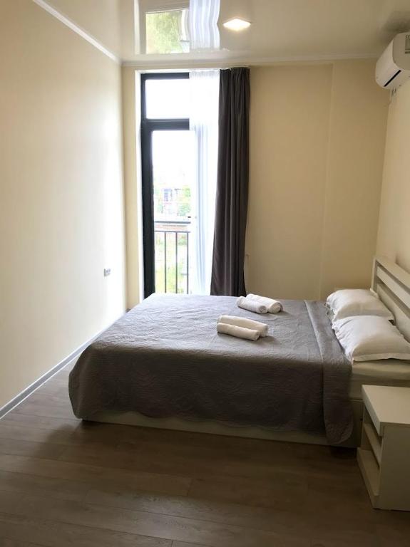 Postel nebo postele na pokoji v ubytování Gurya