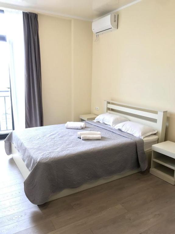 Postel nebo postele na pokoji v ubytování Gurya