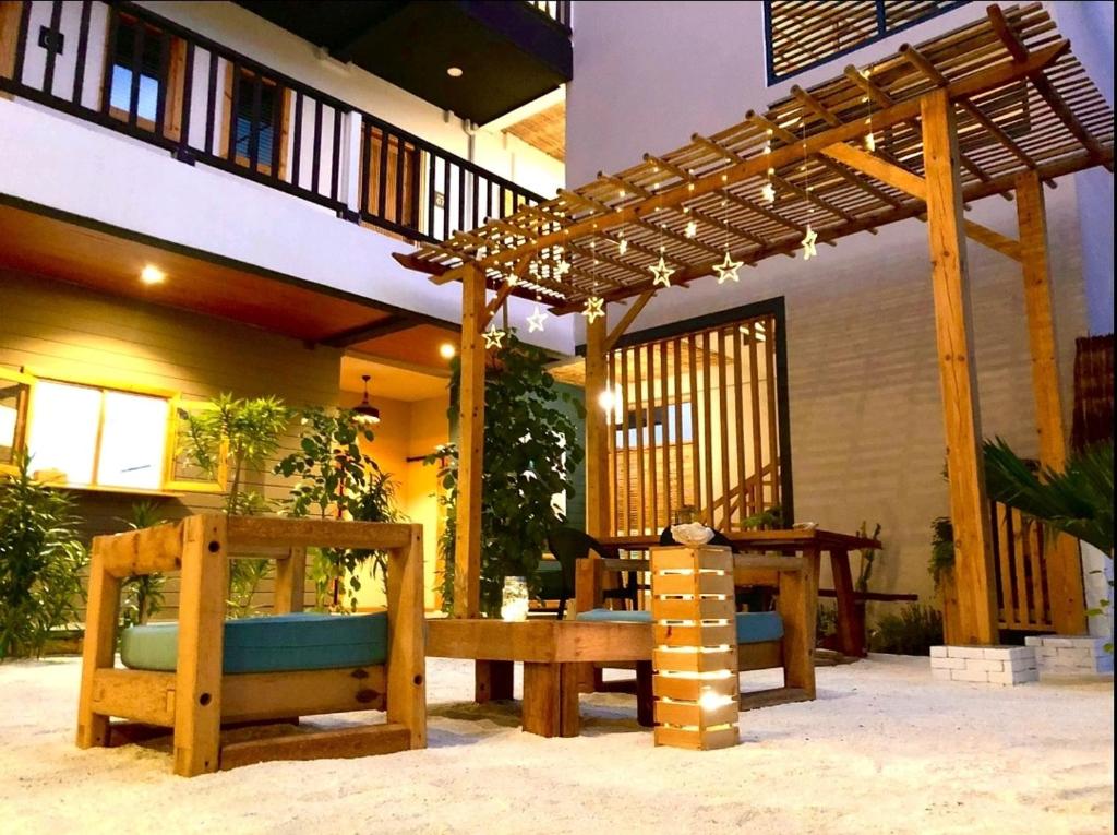 Balkón nebo terasa v ubytování Palms Retreat