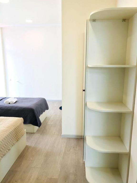 Postel nebo postele na pokoji v ubytování Gurya