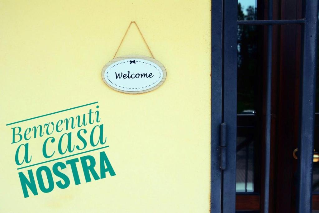 a sign on the side of a building at LA PIGNA mare, collina, Ravenna, Mirabilandia, Cottignola in Ghibullo