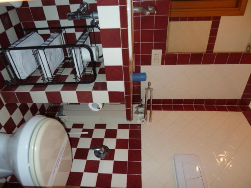 Koupelna v ubytování Hotel Sutrium