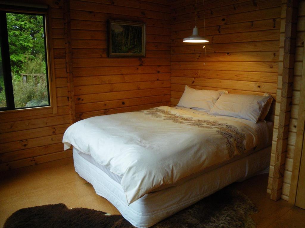 Postel nebo postele na pokoji v ubytování Arthur's Pass Ecolodge