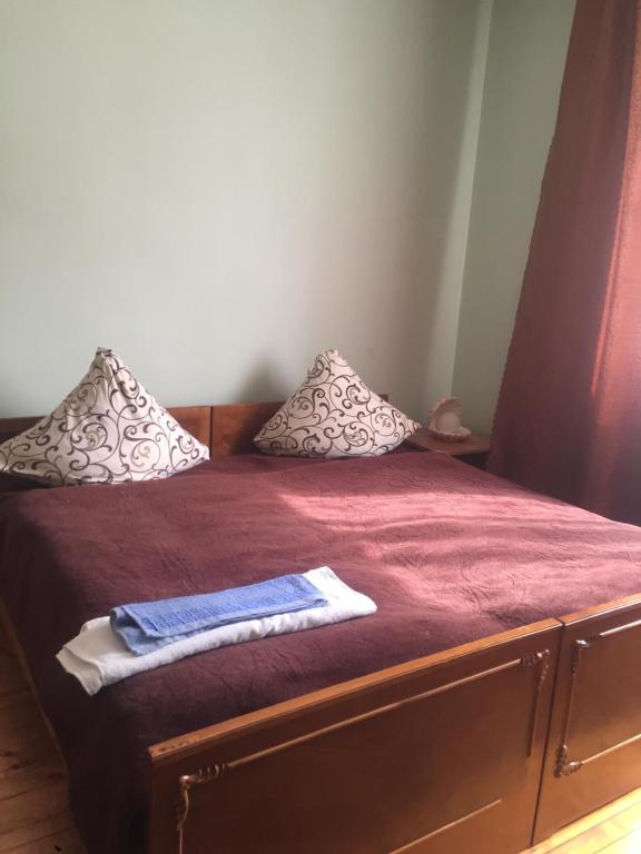 Postel nebo postele na pokoji v ubytování Guest House in Drachino