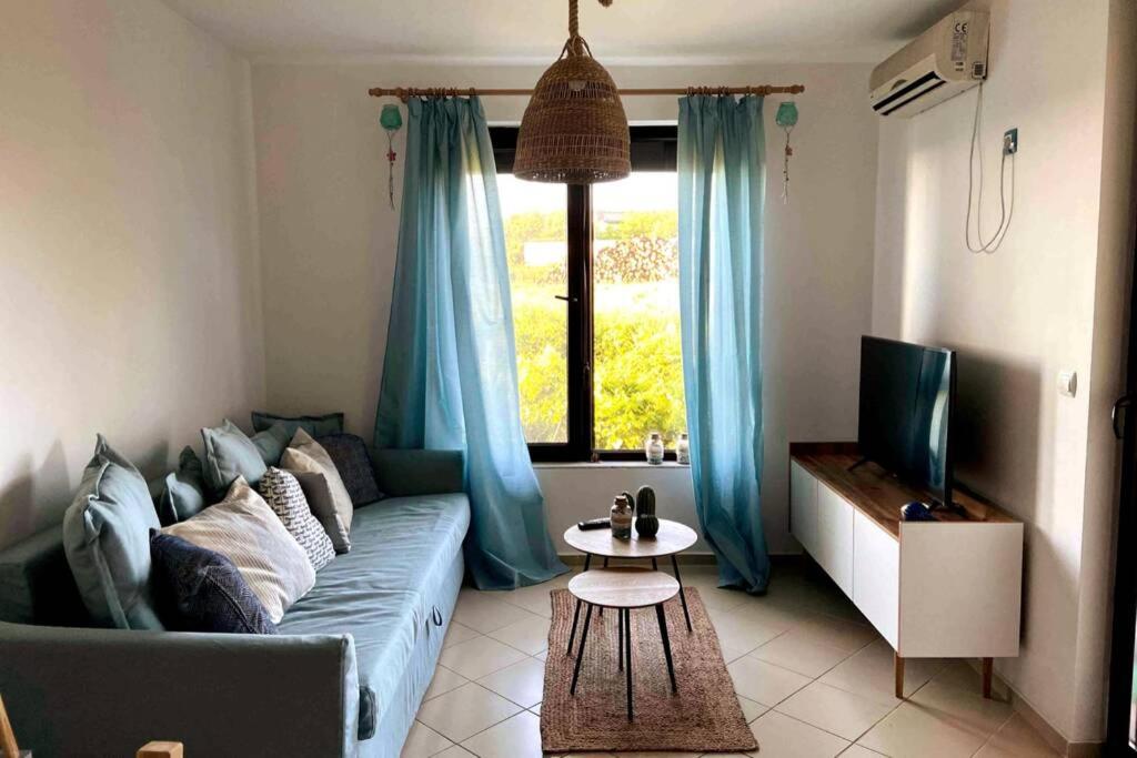 A seating area at Seaview dreamy apartment with a pool and garden