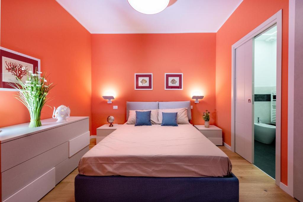A bed or beds in a room at Appartamenti fronte mare Otranto