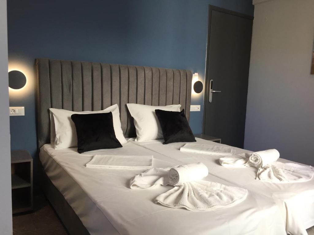 Ліжко або ліжка в номері City Pearl Hotel